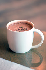 Cup of hot chocolate on the table