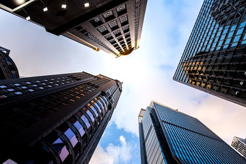 Windows of Skyscraper Business Office with blue sky, Corporate building in hong kong