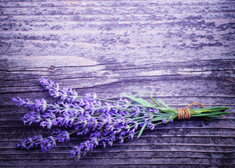 Lavender flowers (Lavandula) on an old wooden background