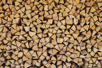Chopped fire wood pile prepared for winter
