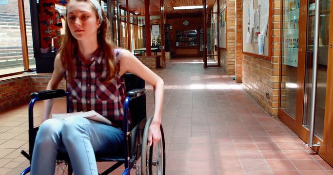 Portrait of disabled schoolgirl in corridor