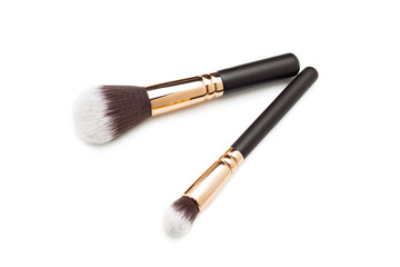 Makeup brushes on white background
