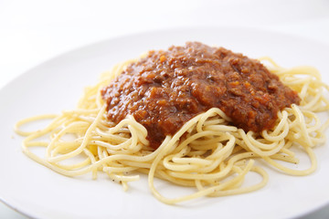 Spaghetti bolognese isolated in white background