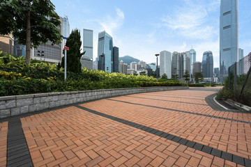 square front of modern office buildings in Shanghai financial district.