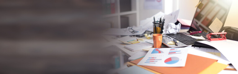 Messy and cluttered desk