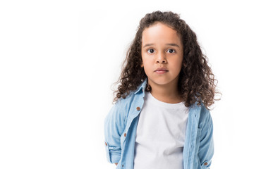 portrait of adorable african american girl looking at camera isolated on white