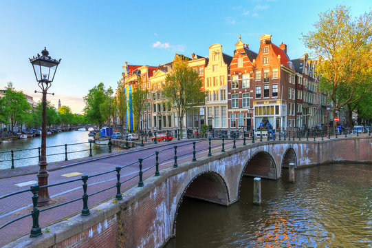 Beautiful sunset at the Emperors canal (Keizersgracht) and Leidse canal in Amsterdam in spring