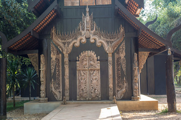 Black house, Lanna art all painted in black. In each house is adorned with carved wooden patterns.