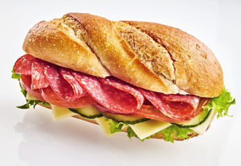 Fresh sandwich with salami, cheese and vegetables