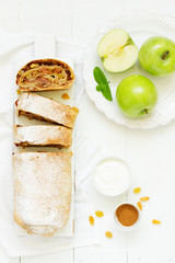 Apple strudel with raisins and almonds. view from above.