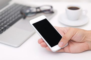White office desk table with a lot of things on it. Top view with copy space.