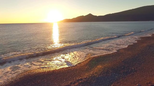 Sunrise on the beach in Greece