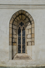 Fototapeta na wymiar Old church window from outside