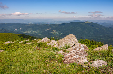 Fototapeta na wymiar huge rocks on the edge of hillside