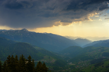 Dramatic sunset in a mountains after storm