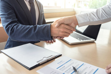 Job applicant having interview, Welcome to team Business people handshake with executive manager to Sign Approval Into the company, business meeting, Greeting deal, congratulation
