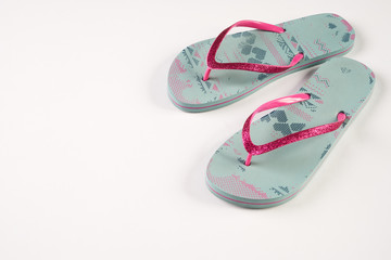Summer beach shoes isolated on white background with copy space.