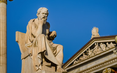 Fototapeta na wymiar Close-up statue of the Greek philosopher Socrates on the background of Sky