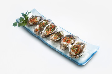 Oyster with chili and herbs