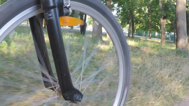 Rotating bicycle wheel. A bicycle wheel close-up.