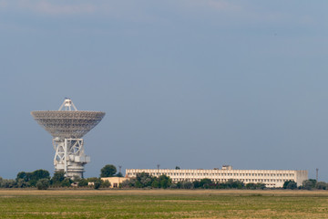  Radar station on background of blue sky / Radio communication system with outer space 

