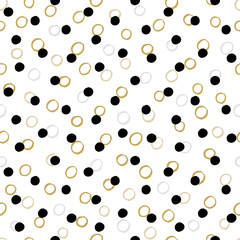 Simple fabric design with black and white polka dots.