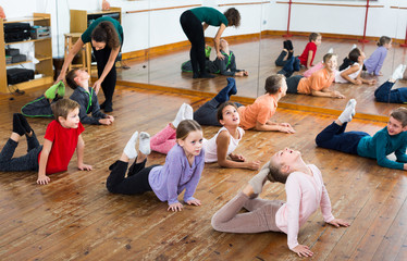 children with trainer stretching