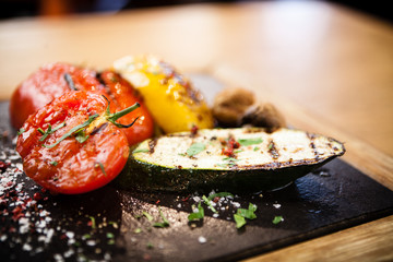 Grilled vegetables on a stone board