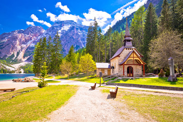 Church and Braies lake in Dolomite Apls