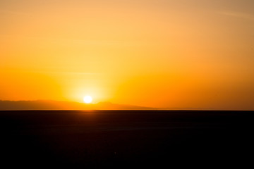 Sunset or sunrise over the Sahara Desert