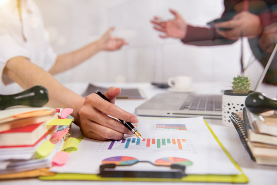 Businessman making presentation with his colleagues