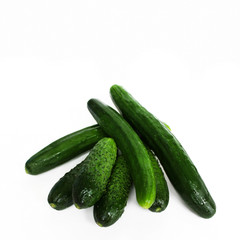 Fresh green cucumbers isolated on white background.