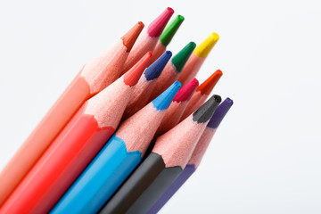 Color pencils isolated on white background. Many different colored pencils. Colored drawing pencils in a variety of colors