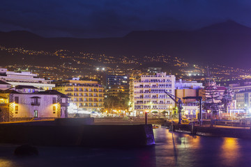 Puerto de la Cruz at night and Teide in the background