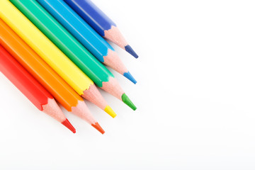 Color pencils isolated on white background. Many different colored pencils. Colored drawing pencils in a variety of colors