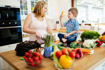 Mother and child preparing lunch