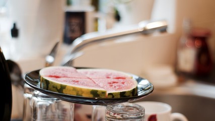 Fresh watermelon in kitchen