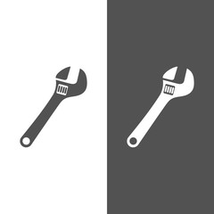 Wrench icon on black and white background