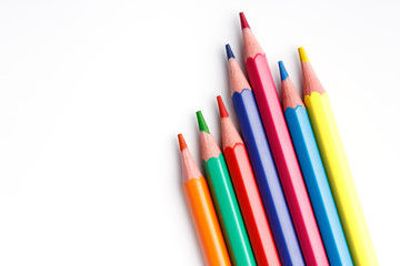 Color pencils isolated on white background. Many different colored pencils. Colored drawing pencils in a variety of colors
