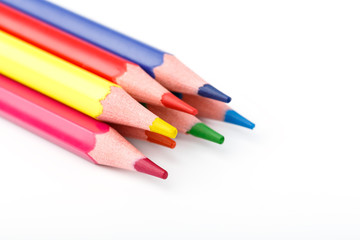 Color pencils isolated on white background. Many different colored pencils. Colored drawing pencils in a variety of colors