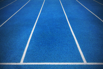 Blue color running tracks on athletics stadium