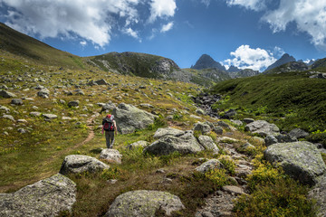 Two unidentified hikers with large backpacks hiking on mountain Kackarlar. Kackar Mountains are a mountain range that rises above the Black Sea coast in eastern Turkey
