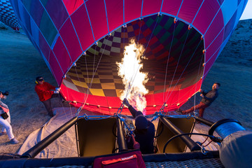 Preparing hot air balloon to flying over the valley at Cappadocia,Anatolia,Turkey.Cappadocia is great tourist attraction place to fly with hot air balloons.NEVSEHIR/TURKEY- JULY 23,2016