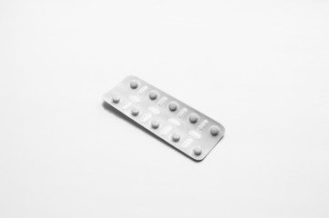 Pack of pills isolated on white background