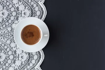 Zelfklevend Fotobehang Turkish coffee on a lace and black background © Berna Şafoğlu