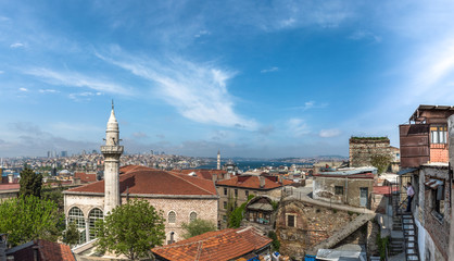 Fototapeta na wymiar ISTANBUL, TURKEY - MAY 05, 2017:View of galata tower from roof of Buyuk Valide Han an old Ottoman inn that accommodated traveling merchants over 350 years ago