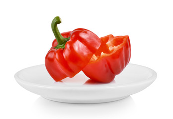 red pepper in white plate on white background