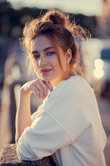 beautiful stylish girl with sunset light