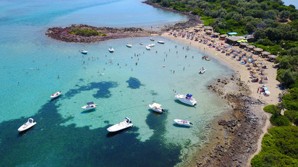 Aerial drone photo of Monolia island exotic beach with sapphire and turquoise clear waters, called the 