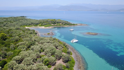 Aerial drone photo of Monolia island exotic beach with sapphire and turquoise clear waters, called...